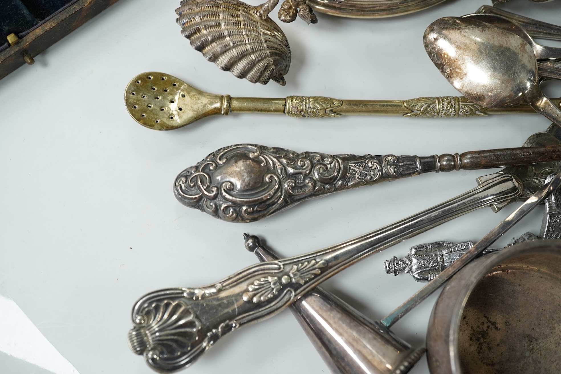 A collection of various plated wares and small silver